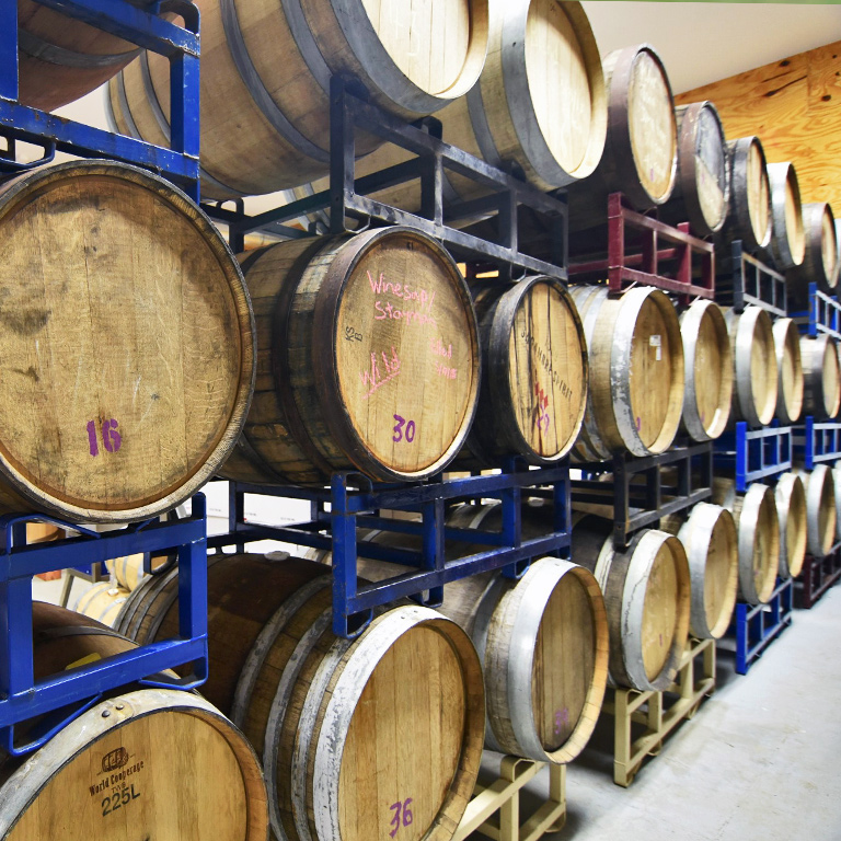 Our ciders, fermenting and maturing in wood barrels, at our farm and tasting room in Maidens, Virginia.